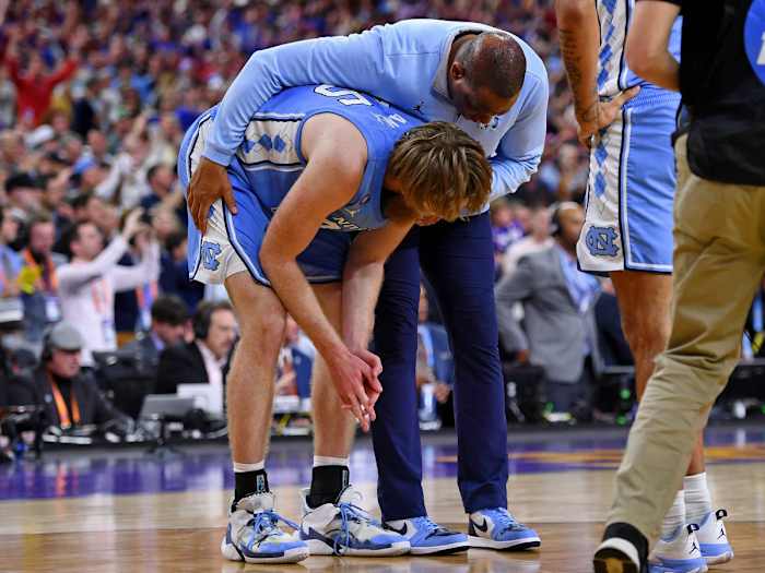 Hubert Davis consoles Brady Manek